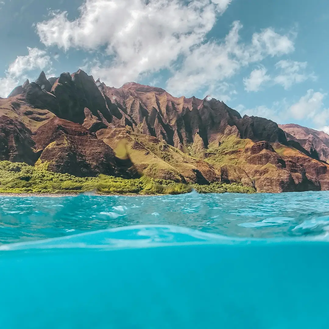 Tour boat cruising near Hanalei Bay, Kauaʻi
